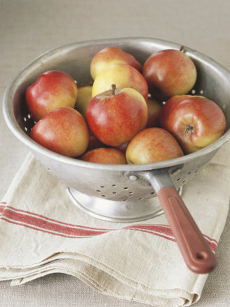 Fresh Red Apples in Colander